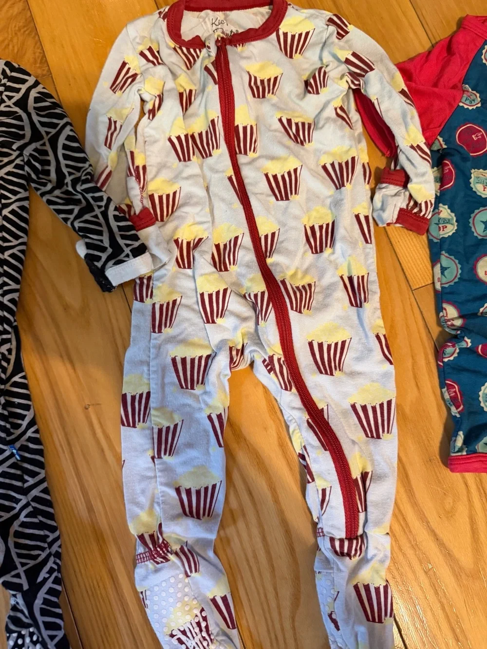 Kickee Pants Mixed Print Footed Sleepers in Blue, Green & Red